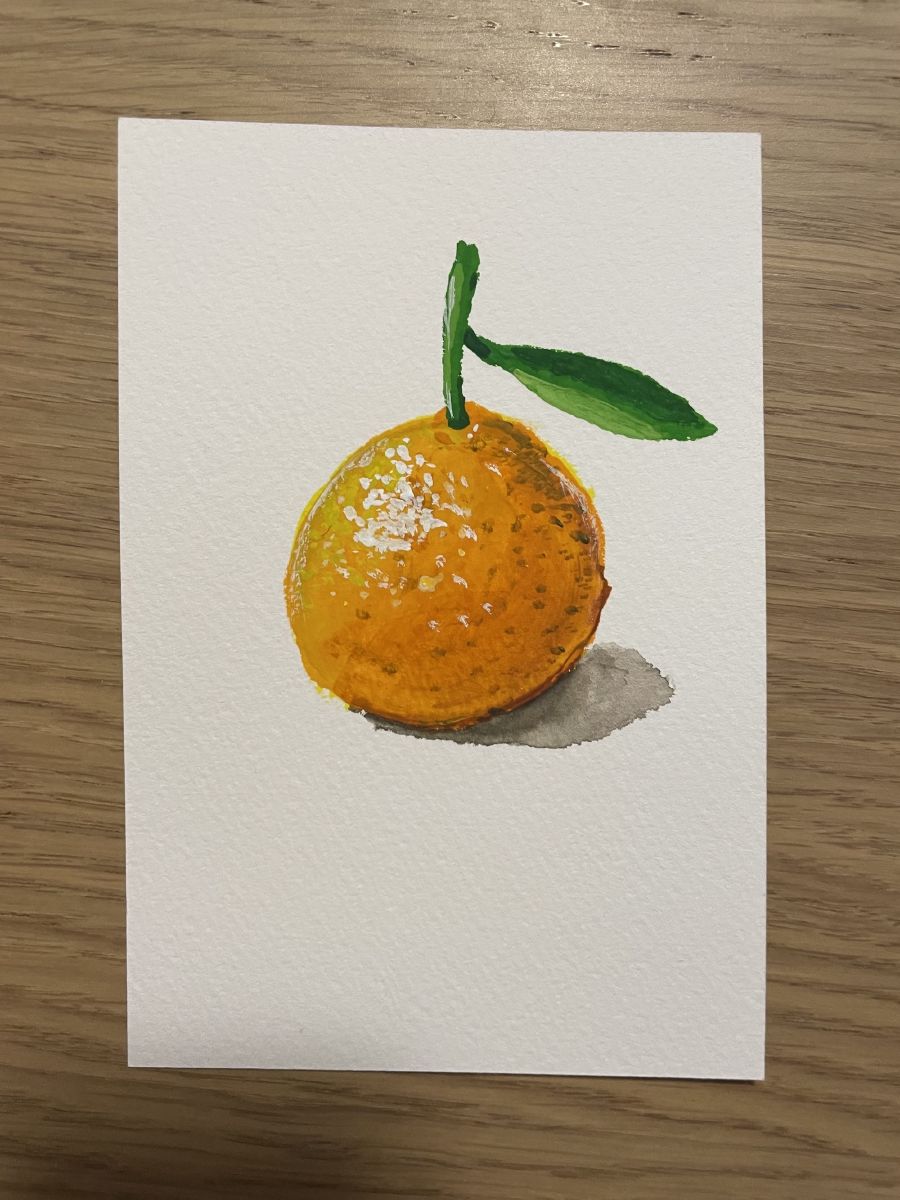 
An orange/citrus/yuzu looking fruit.
