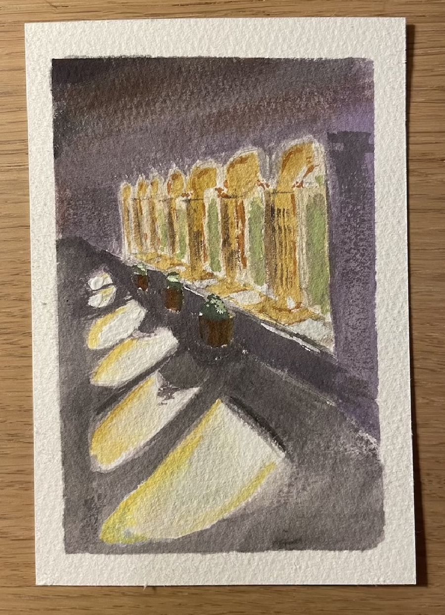 
Hallway of some fun archway with sunlight
